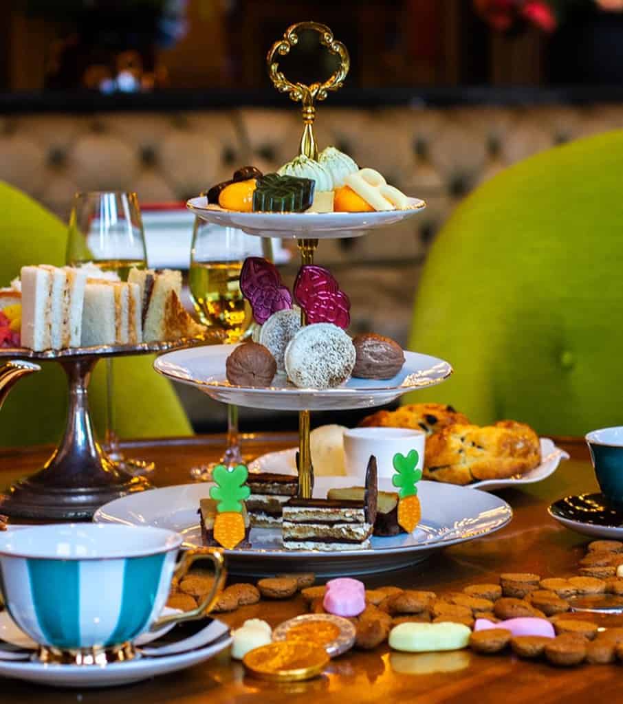 December afternoon tea at the duchess in amsterdam includes traditional holiday sweets among elegant sweets and savories.