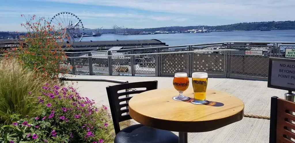 old stove brewing company has a nice view of the sound behind seattle's pike place market.
