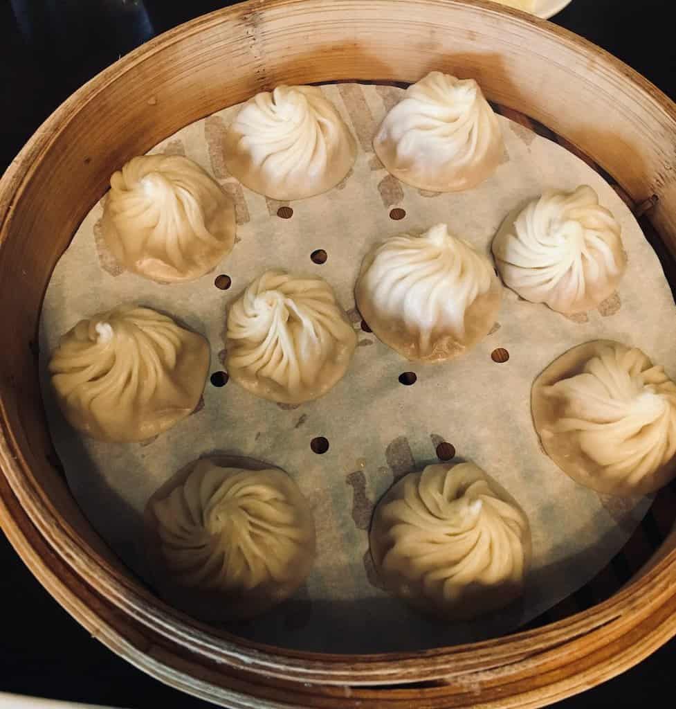 A basket of dumplings from din tai fung in university heights.