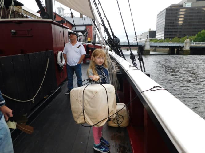 Throwing tea overboard at the boston tea party experience.