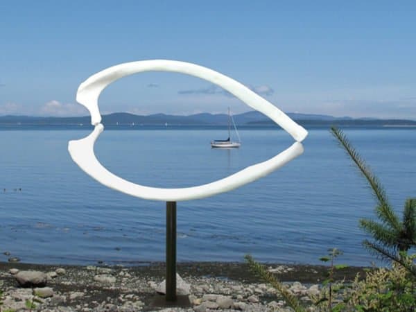 one of a series of outdoor sculptures along the seawall in sidney, bc. this one looks like a wishbone from a whale. 