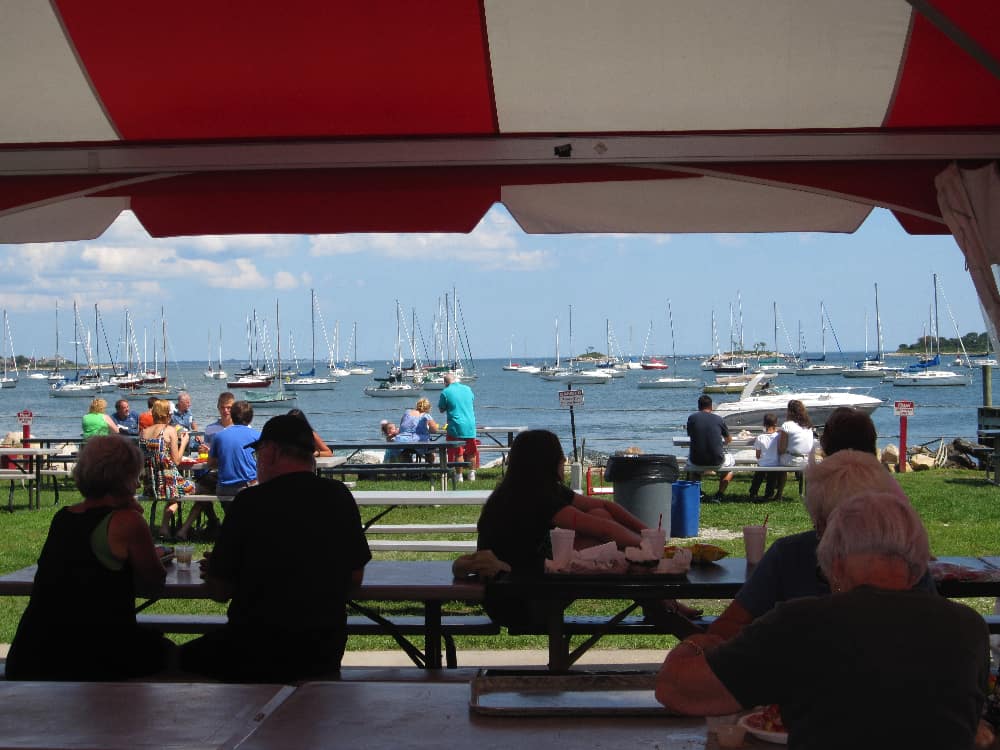 Abbott's lobster shack has outdoor picnic tables with views of the sailboats in the long island sound.