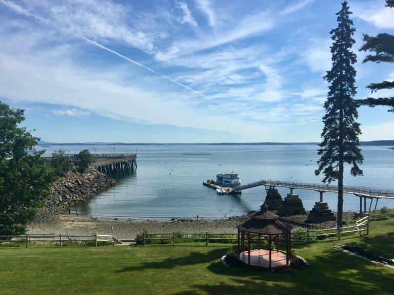 the view of lawn and ocean from our balcony at atlantic oceanside hotel in bar harbor