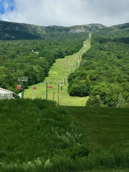 a summer view from the bottom of the mansfield mountain gondola in smugglers notch.