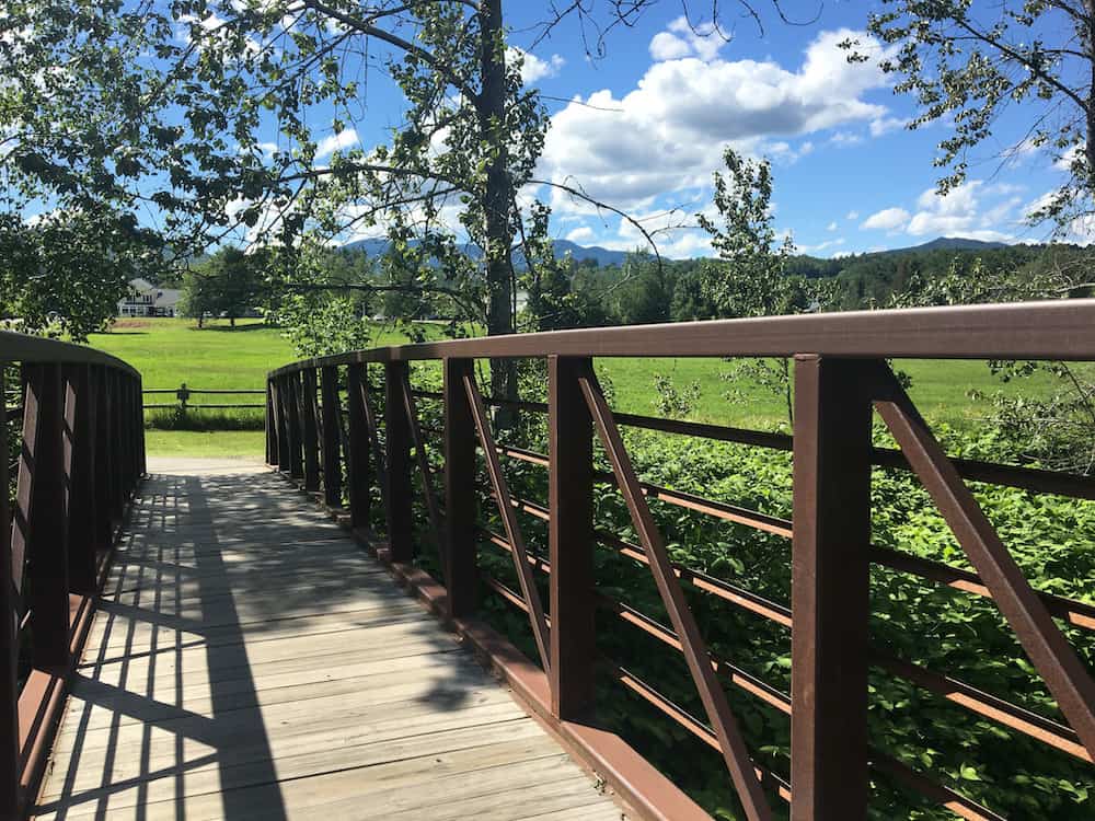The Stowe recreation path crosses bridges and offers field and mountain views.