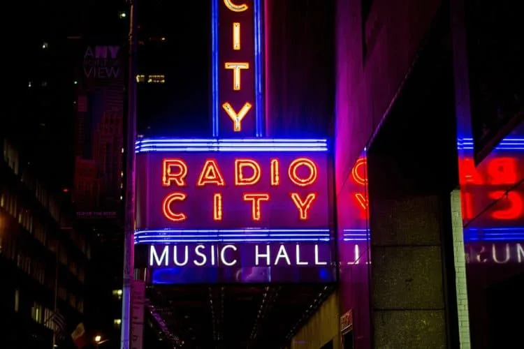 the marquis at radio city lit up at night