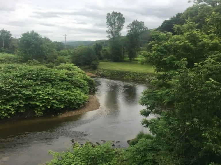 a typical bucolic view around stowe. streams, fields, trees and hills. all very green in summer.