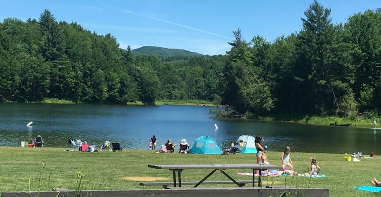 The lawn at waterbury state park offeres picnicking and the opportunity to swim in the pristine reservoir.