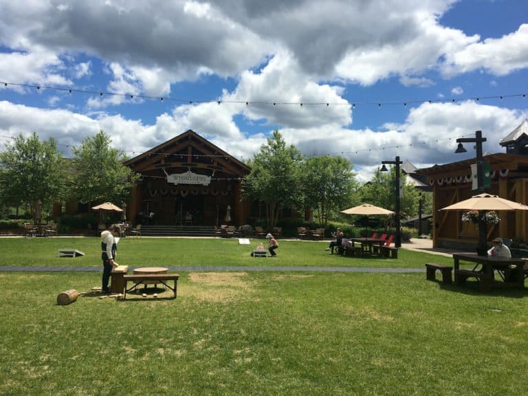 The green at sprink peak resort village has picnic tables, lawn games and whistlepig bbq for an easy kid-friendly lunch.