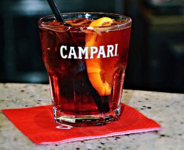 the aperitif campari is the key ingredient in a negroni, a popular and classic italian cocktail that is usually served in a short glass over ice.