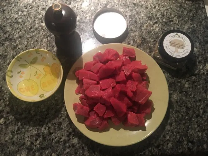 ingredients for beef skewer ciccheti for an italian night party: beef cubes, evoo, salt, pepper and seasoning