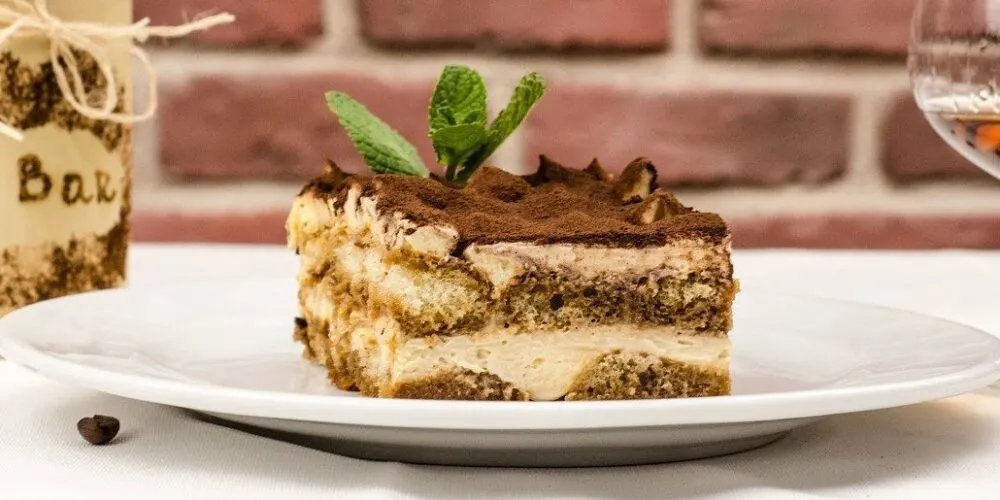 a square of tiramisu, which is easier to make than you might expect and essential to your staycation italian dinner.