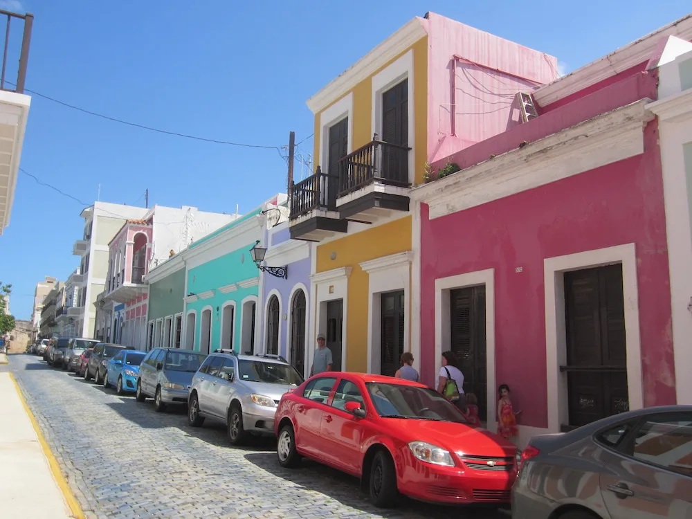 san juan's colorful houses and narrow streets add a dimension to a beach resort vacation here.