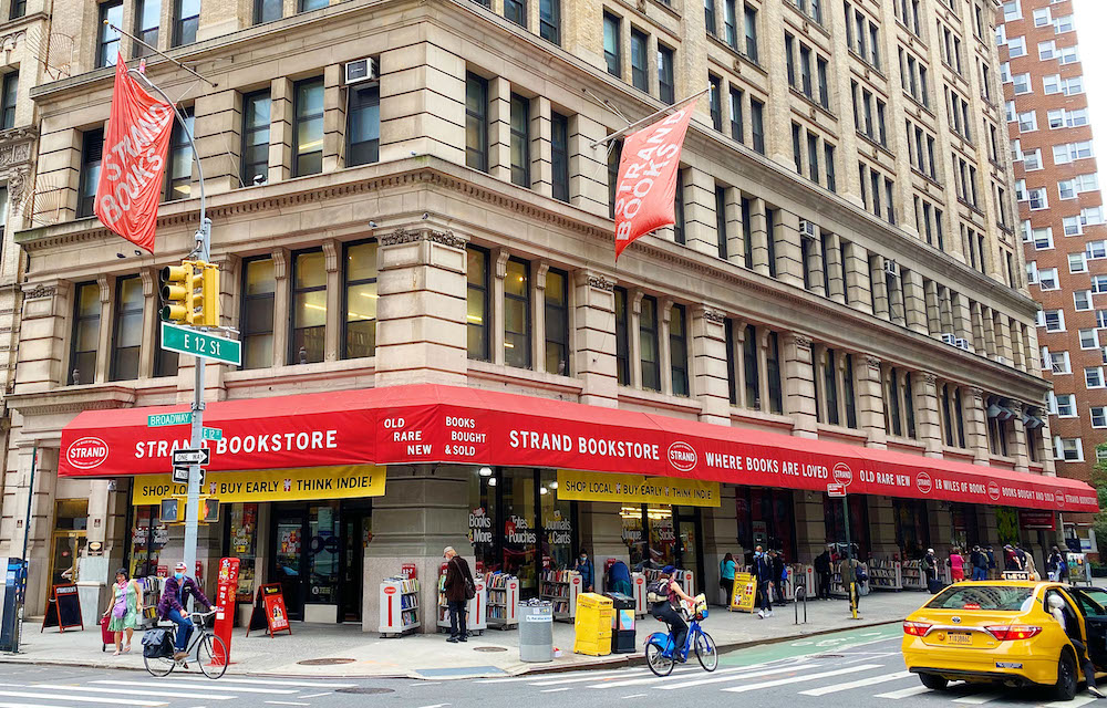 strand book store with its bright red awnings, is one of the biggest used book stores in the u.s.
