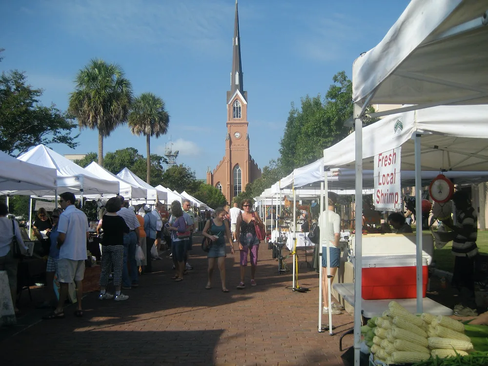 the farmers market on saturday in marion square is a great way to get a feel for local charleston food and culture.