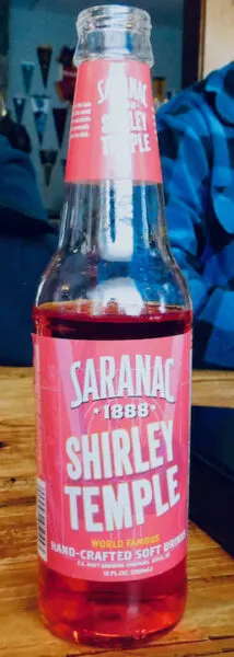 saranac soda's bottled shirley temple cocktail is bright red and easy to find in adirondack towns.