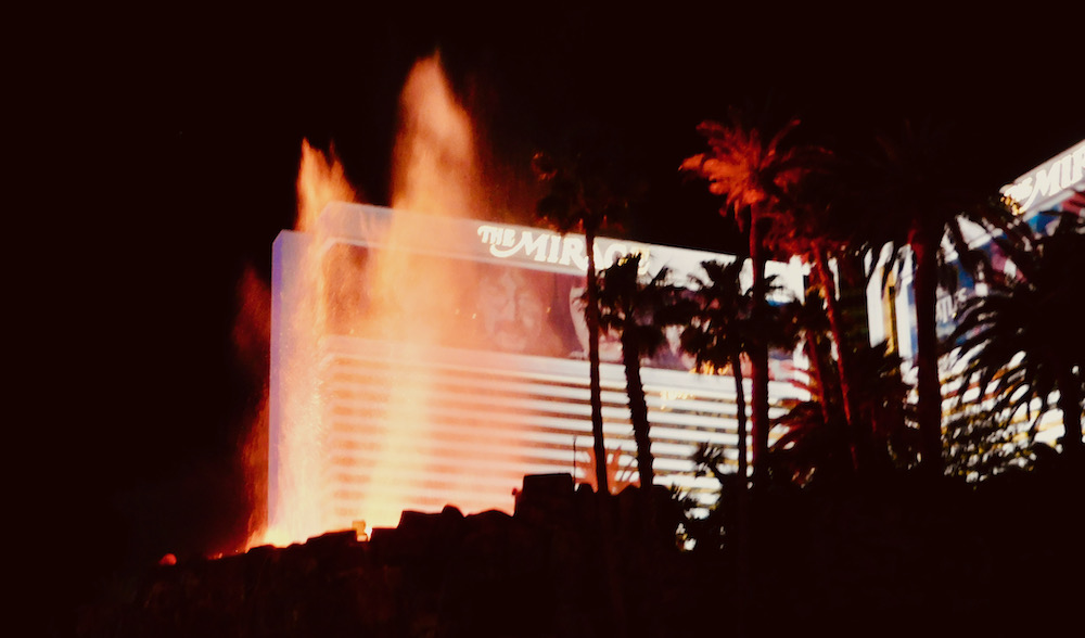 Music and pyrotechnics light up the volcano in front of the mirage hotel on the las vega strip.