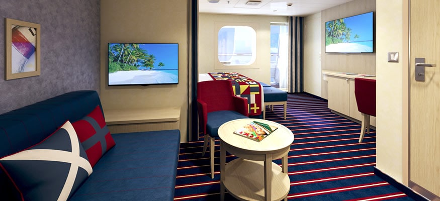 Carnival cruise lines has family harbor suites with extra room, balconies and a fun nautical color pallet