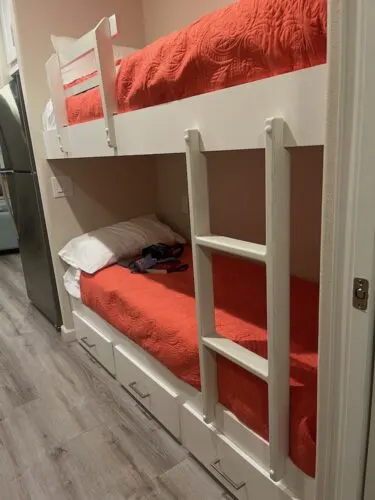 bunk beds had outlets next to them and drawers below in the camp margaritaville cabana cabin