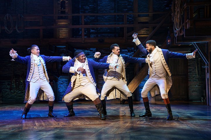 Hamilton and friends carouse over wine in one of the tavern scenes in hamilton, a broadway show that teenagers have rushed to see.