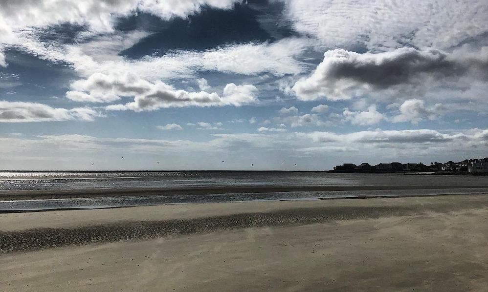 Isle of palms is a great beach withs school-age kids. The sand stretches for a long way and there is lots to do on the water.