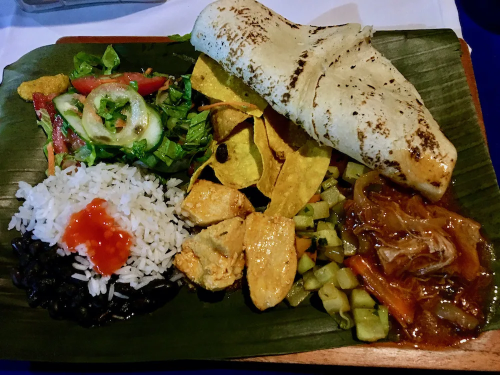 The Best Ways To Explore Costa Rica With Kids A farmhouse dinner at casa vida near la fortuna includes beef in salsa, stewed chicken, chayote, rice and beans and homemade tortillas.