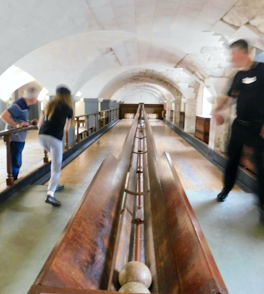 At what used to be the royal naval hospital, residents played skittles with woodenn pins and old cannon balls.