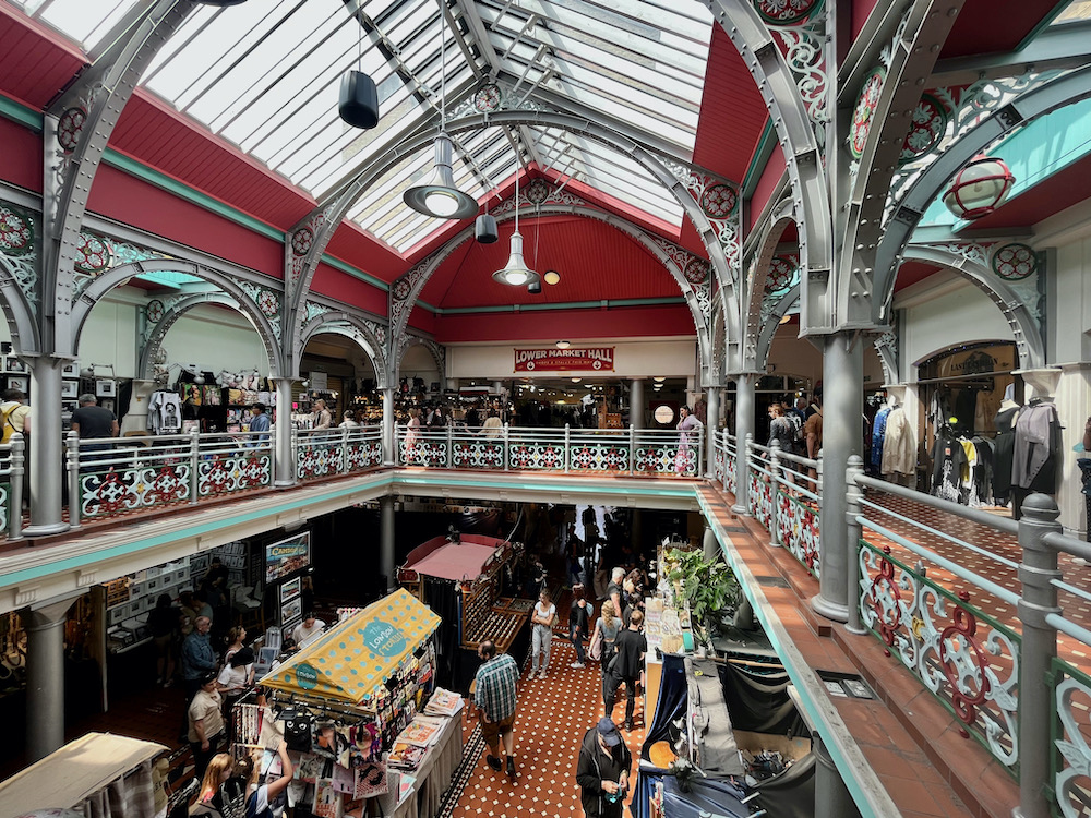 the maon markethall at camden market has victorian architecture and stalls with all kinds of goods at all prices.