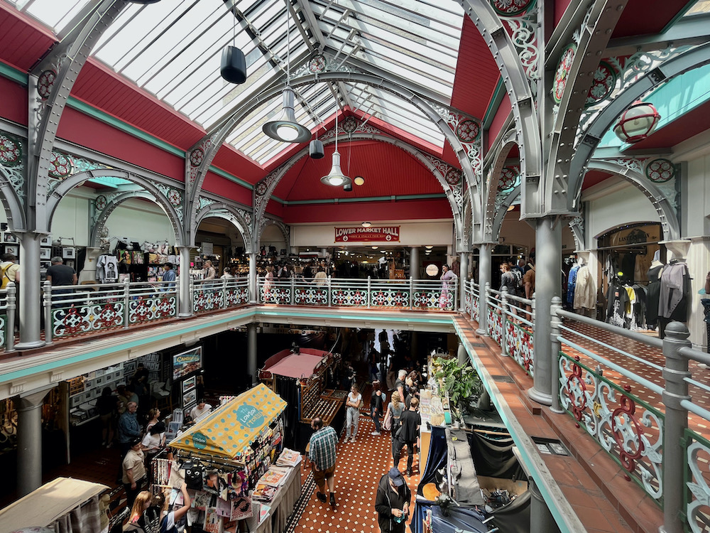 The maon markethall at camden market has victorian architecture and stalls with all kinds of goods at all prices.
