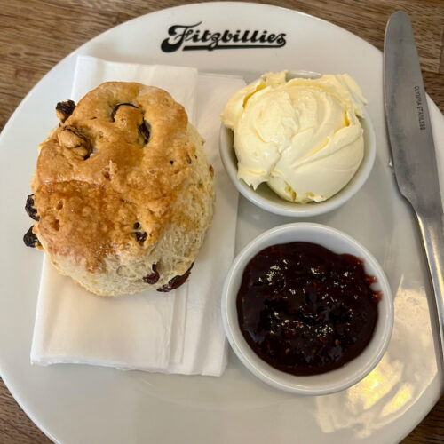 traditional raisin scones come with clotted cream and raspberry jam at fitzbillie's tea room.