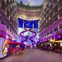 The soaring Boardwalk atrium at the heart of Royal Caribbean's new cruise ship, Wonder of the Seas.