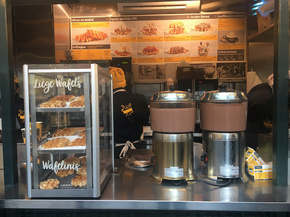 The wafels and dinges stand in herald square is a good place for warm waffles and hot cocoa after seeing santa at macy's.