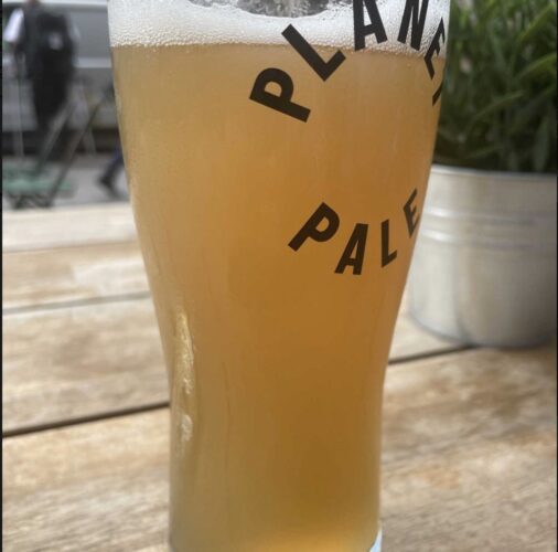 a glass of pale ale made in-house at brewdog in london.
