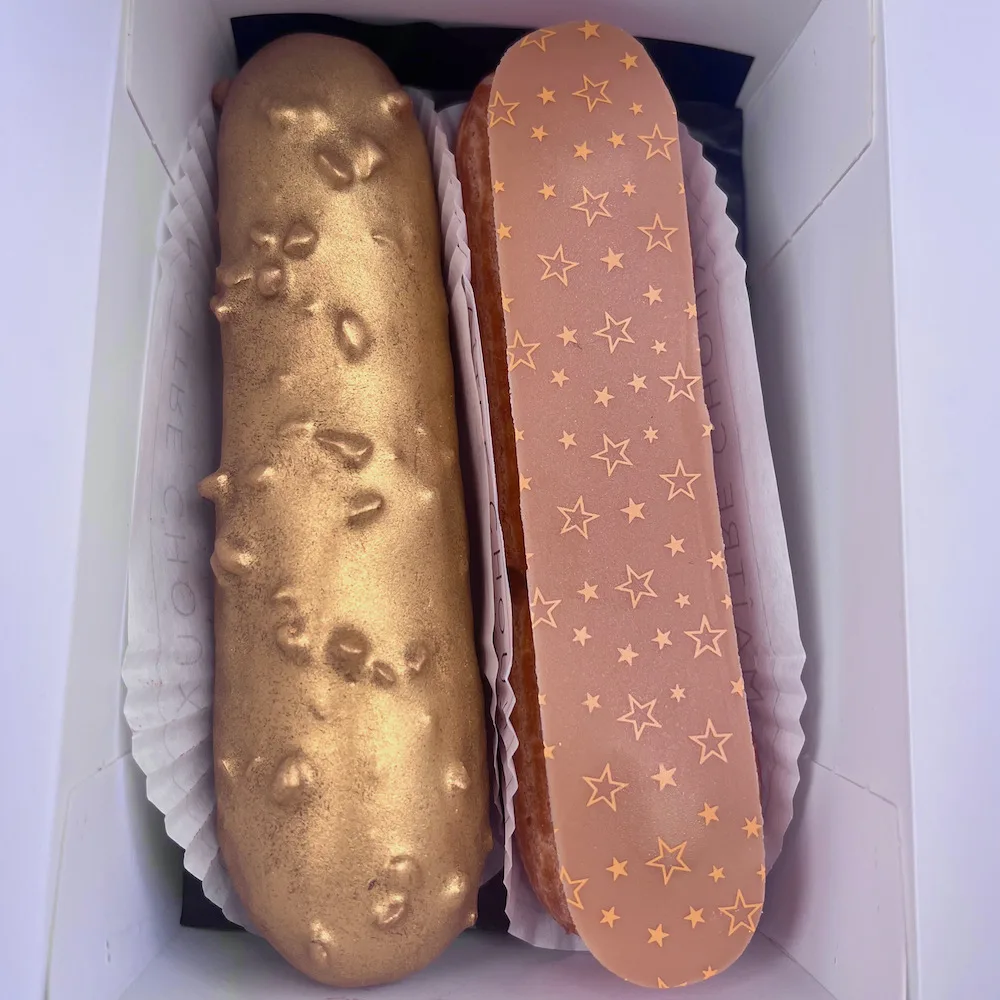 the eclairs at fortnum & mason are pretty as well as delicious, covered in gold-colored chocolate or chocolate leaf painted with stars.