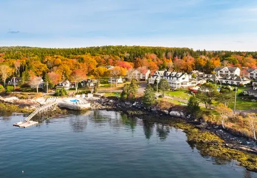 spruce point inn has fall foliage and a coastal view, perfect for a fall getaway