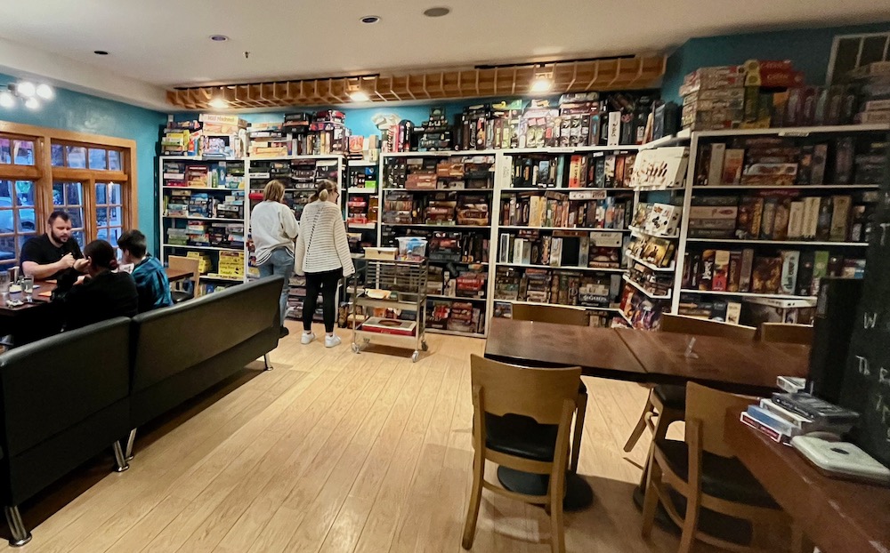 The queen and rook in south philly is a cafe´with an enormous board game library.