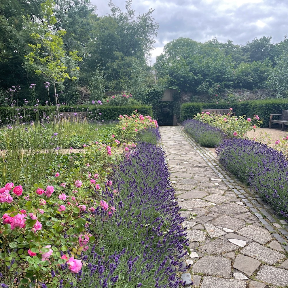 The pretty,manicured gardens behind the museum of literature in ireland.