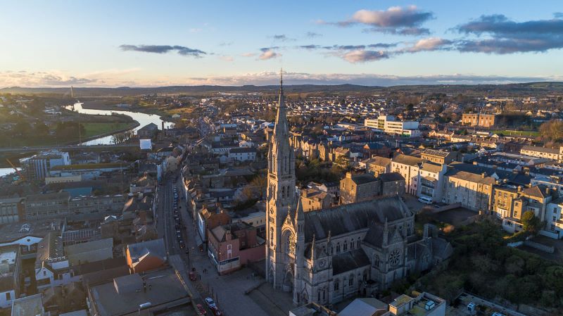 Drogheda is a riverside town in the boyne valley with a large church spire.