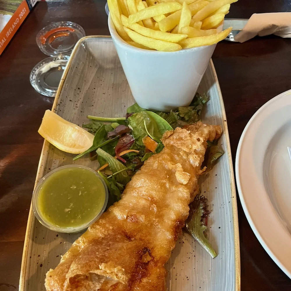 battered fish and shoestring fries with a mesclun salad from the harbourmaster in dublin.