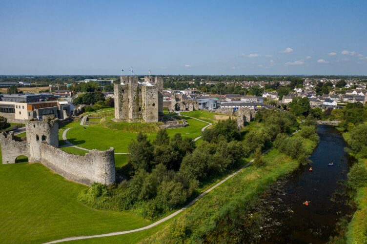 Trim castle is a tall fortress that sits betwee the boyne river and a former medieval town.