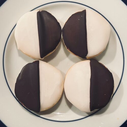 A plate of mini black & white cookies, a nyc classic.