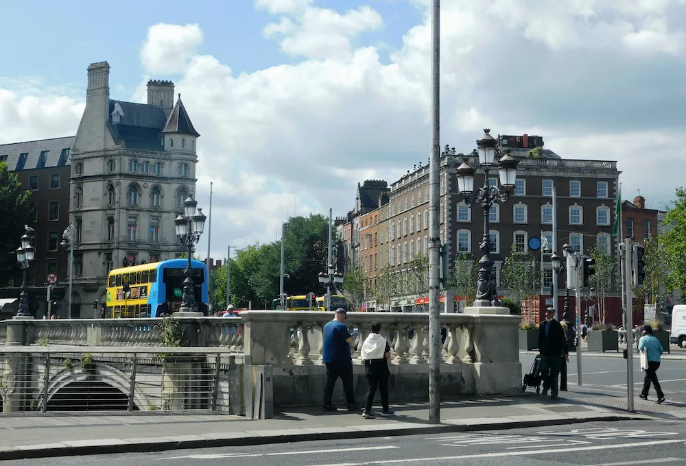 busy o'connel street bridge and the start of grafton street in dublin