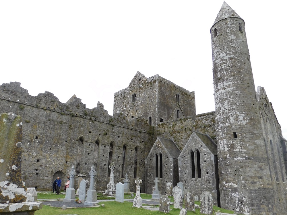 The ancient rock of cashel is a popular tourist destinations that teens like to wander around.