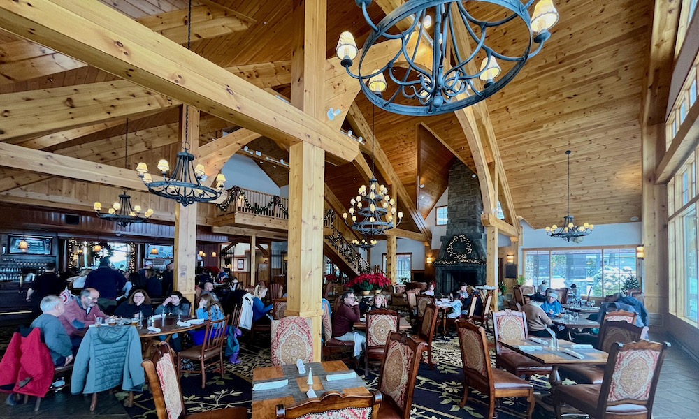 The great room at the crowne plaza hotel in lake placid is a warm and friendly space whre families can gather.