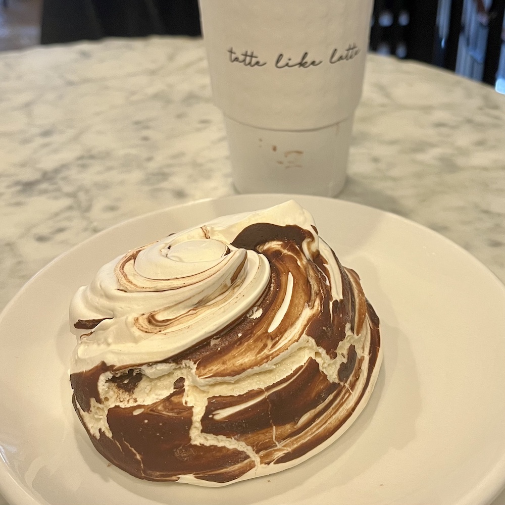 A chocolate-swirl merengue and coffee from tatte.