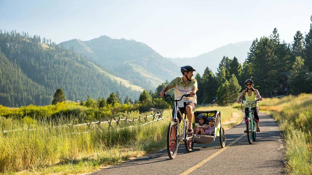 Scenic paved trails and rentals with trailers for kids make family biking easy in lake tahoe.