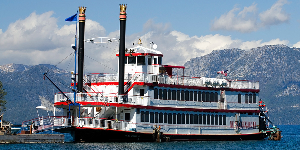 the dixie is a triple-decked steamboat that tours lake tahoe in the warm weather.