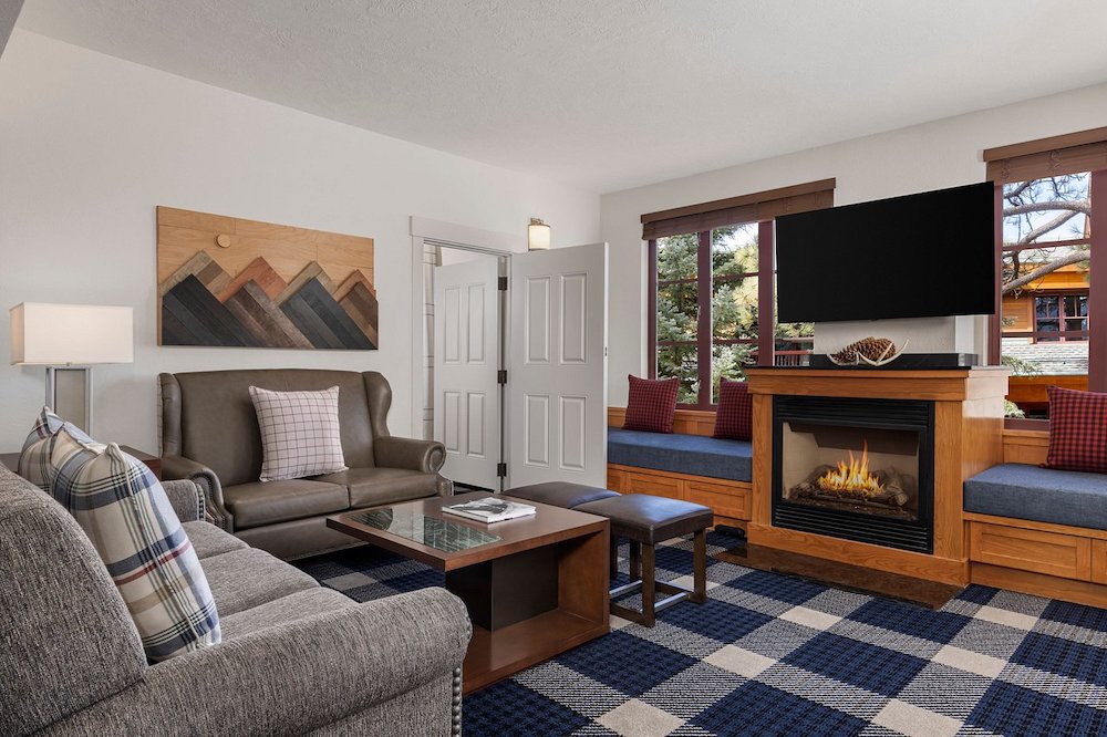 all rooms at the marriott at heavenly in lake tahoe have living areas with fireplaces and modern plaid accents.