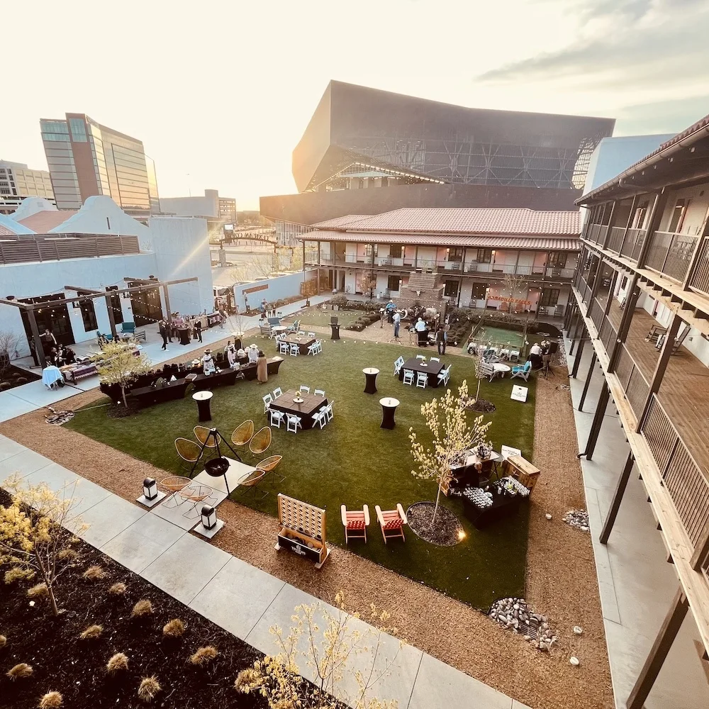 at the texican hotel, the central lawn is a place to sip a cocktail,play lawn games and relax