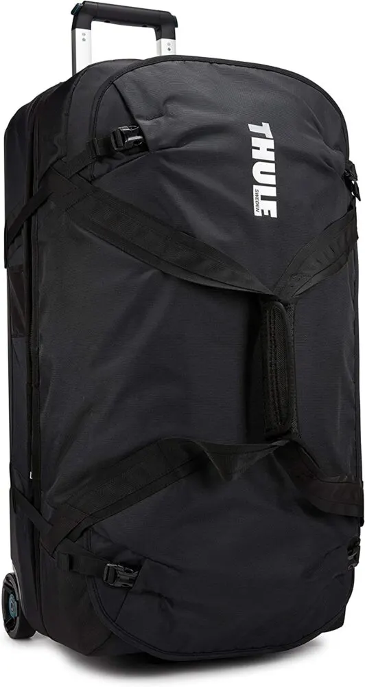this thule subterra is 2 duffle bags clipped together and one has wheels. it's the ideal travel bag for moms who want to pack one suitcase for them and their kids.